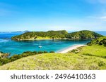 Waewaetorea Island, Bay of Islands, North Island, New Zealand, Oceania.  
Waewaetorea Island with Okahu Island in the background. 