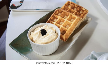 Waffer with cream for breakfast - Shutterstock ID 2315230155