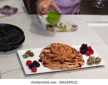 A waffle in the form of a weed leaf. Wake n Bake