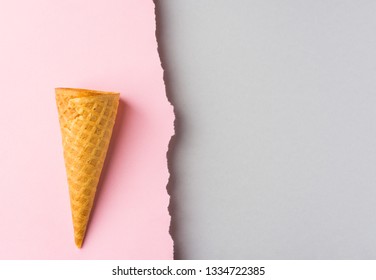Waffle ice cream cone with on duotone pink grey paper background with torn frazzle edge. Styled image mockup flyer poster template for cafe menu collage elements artwork text lettering. Funky