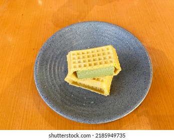 Waffle Ice Cream Sandwich, Green Tea Flavour, Served On A Plate. A Dessert After Meal.