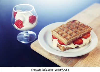 Waffle Sandwich With Caramel Ice Cream Dessert On White Plate With Strawberries 