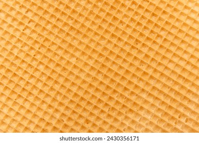 Waffle texture close up. Wafer sheet. homemade baking