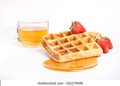 Waffles And Syrup With Tea