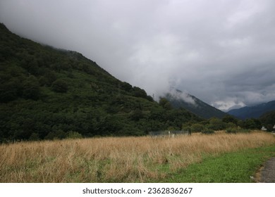 wafts of fog in the Pyrenees - Shutterstock ID 2362836267
