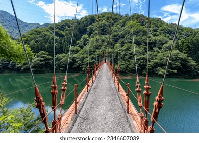 Wagatani Suspension Bridge, across Daishoji River. Yamanakaonsen Wagatanimachi, Kaga, Ishikawa, Japan.
