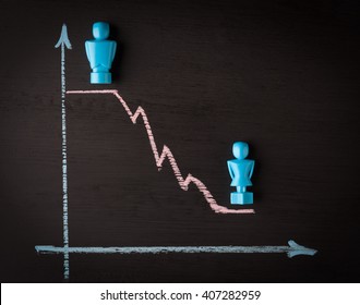 Wage Gap And Gender Equality Concept Depicted With Male And Female Figurines And Hand Drawn Chalkboard Line Graph