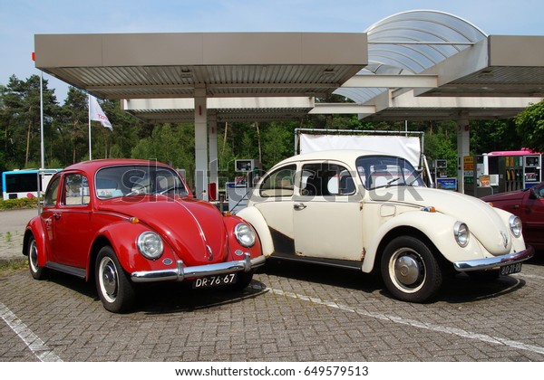 Wageningen, the Netherlands - May 29, 2017:\
Volkswagens Type 1 parked on a public parking lot in the city of\
Wageningen. Nobody in the vehicle. The VW T1 is also known as\
Beetle, Bug and\
Kafer.
