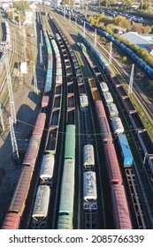 Wagons Of Freight Train Aerial View. Carriages On Railway Siding. Cargo Freighter Wagons