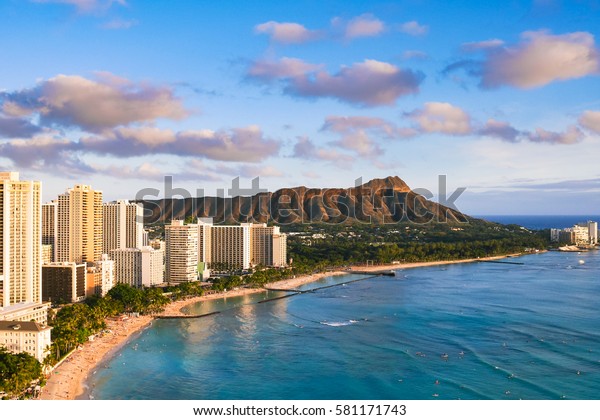 Waikiki Beach and Diamond Head Crater including\
the hotels and buildings in Waikiki, Honolulu, Oahu island, Hawaii.\
Waikiki Beach in the center of Honolulu has the largest number of\
visitors in Hawaii