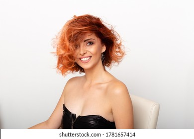 Waist Up Portrait Of Beautiful Redhead Woman With Messy Hair Looking Really Happy. Close Up Of Attractive Young Female With Big Smile On Her Face. 