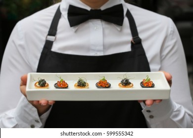 Waiter With Canapes / Canapes With Caviar / Catering