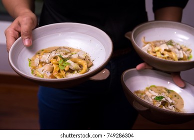 Waiter Serve Yellow Spaghetti With Black Truffle With Busy Hand