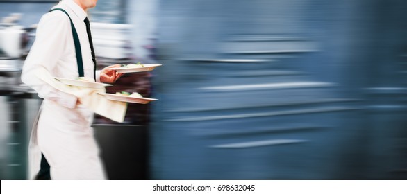 Waiter Serving In Motion On Duty in Restaurant Long Exposure | Copyspace