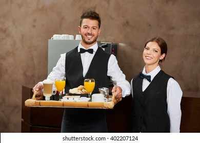 Waiter Staff Team Serving Breakfast In A Hotel Restaurant