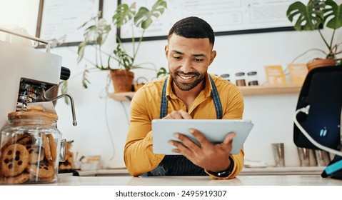 Waiter, tablet and smile in cafe for hospitality, website and service with virtual menu, stock and app. Black man, tech and happy in restaurant for online order, inventory and digital transformation - Powered by Shutterstock