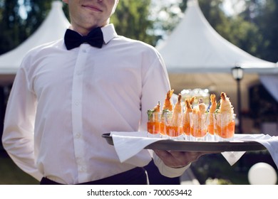 Waiter Walking With Appetizers