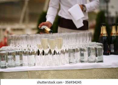 waiters poured champagne