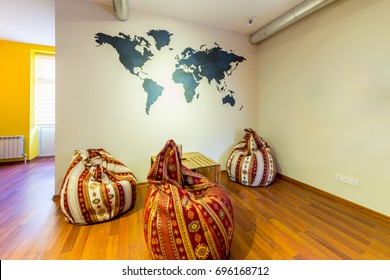 Waiting area in hotel with bean bag chairs - Powered by Shutterstock