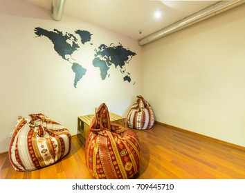 Waiting area in hotel with bean bag chairs - Powered by Shutterstock