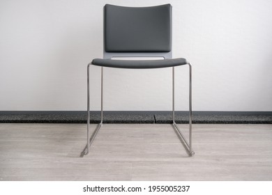 Waiting Concept: An Empty Chair In A Modern Waiting Room Or Area - Selective Focus, Lots Of Copyspace, No People