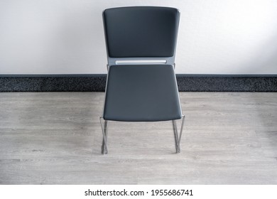 Waiting Concept: High Angle View Of An Empty Chair In A Modern Waiting Room Or Area - Selective Focus, Lots Of Copyspace, No People