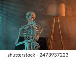 Waiting concept. Human skeleton sitting in armchair indoors