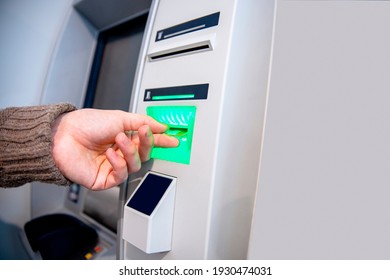 Waiting for the credit card inserting from ATM Machine. Copy space for text 