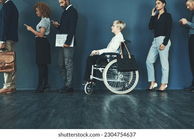 Waiting, interview line and woman inclusion in wheelchair for business recruitment in office. Diversity, technology and employee people with disability in waiting room queue for hiring inn workplace - Powered by Shutterstock