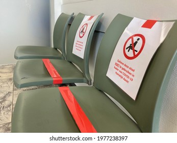 Waiting Room With Blocked Off Seats To Ensure Social Distance (English Translation Of Dutch Text: 