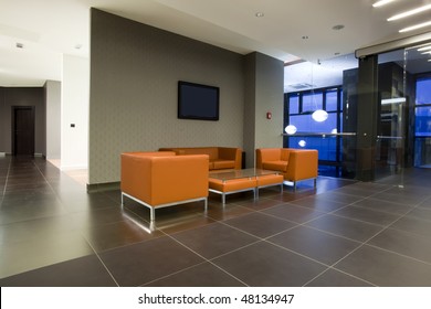 Waiting Room With Orange Leather Furniture