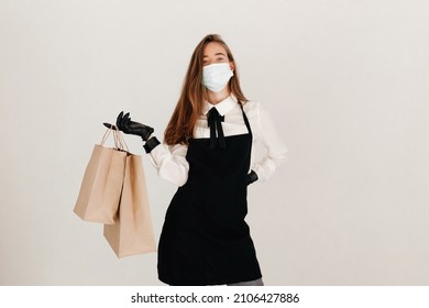 Waitress Giving Takeaway Order. Food And Coffee Delivery Concept