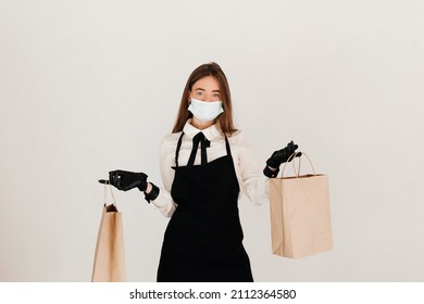 Waitress Giving Takeaway Order. Food And Coffee Delivery Concept