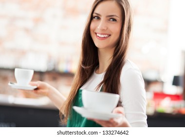 Waitress serving coffee