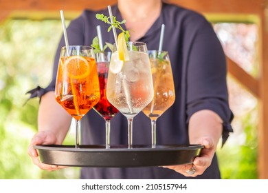 A Waitress Serving Delicious Summer Cocktails
