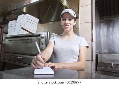 Waitress Taking Order In A Fast Food Restaurant