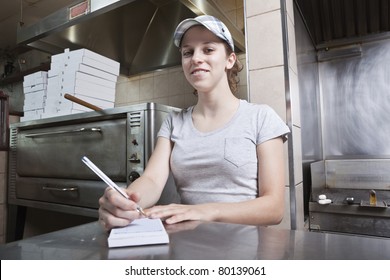 Waitress Taking Order In A Fast Food Restaurant