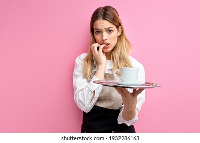 Waitress Woman Holding Tray With Cup Over Isolated Pink Background Stressed And Worried. Fear And Upset For Mistake. Portrait Of Young Staff Of Restaurant Of Cafe