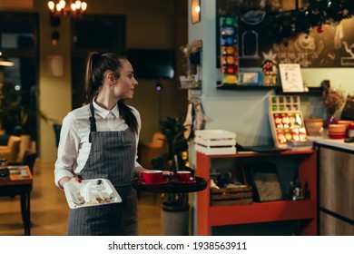 waitress working in cafe or restaurant