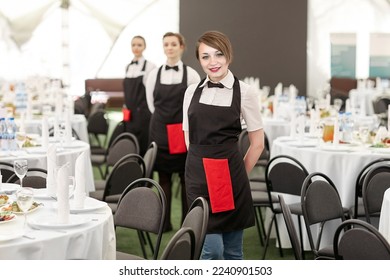 waitresses standing in the Banquet hall of the restaurant - Powered by Shutterstock