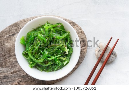 Wakame seaweed salad with sesame seed. Traditional Japanese food.  Top view. 