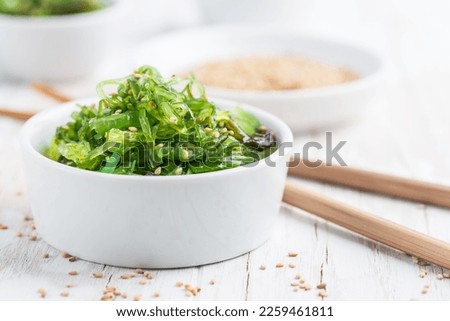 Wakame seaweed salad with sesame seeds. Traditional Japanese food.