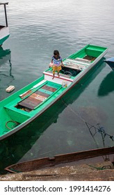 Wakatobi, Indonesia-10-12-2012: People in Wangi-Wangi Island, Wakatobi, Indonesia, using traditional boat for their mobility from an island to another islands since Wakatobi is an archipelago regency 