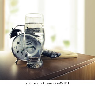 Wake Up With The Alarm Clock And A Glass Of Water