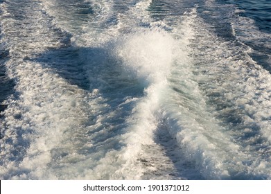 Wake Behind The High Speed Passenger Ship, Catamaran, Leaving The Sea Foam And Wave Pattern On The Water Surface, Adriatic Sea