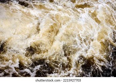 Wake Brown Water Bubbling Behind Ship With Bubbles And Splashes Background Texture.