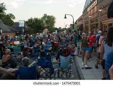 Wake Forest, NC/United States- 08/09/2019: Visitors To Downtown Wake Forest Enjoy Live Music During A 