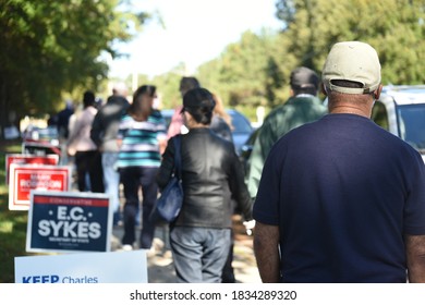 Wake Forest, NC/United States- 10/15/2020: Voters Stand In Line On The First Day Of Early Voting In North Carolina. (Soft Background Focus). 