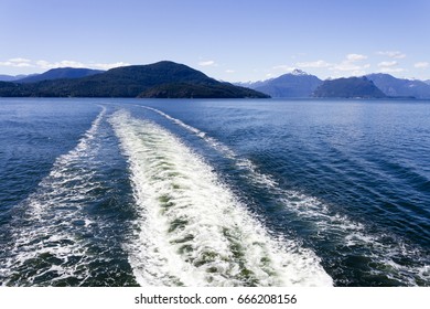 Wake from a passenger ferry in Howe Sound traveling between Horseshoe Bay Terminal and Langdale Terminal in British Columbia, Canada.