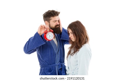 Waking Up By Alarm Clock Signal. Pretty Woman And Bearded Man Holding Alarm Clock Early In The Morning. Sleepy Couple In Love With Mechanical Clock. Sensual Girl And Hipster Reading Time On Clock